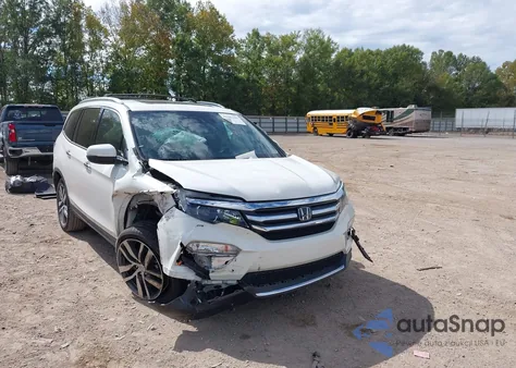 2017 Honda Pilot Elite z USA, uszkodzony, nr VIN 5FNYF6H00HB002353